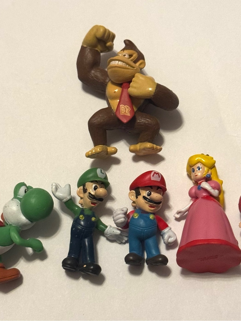 Nintendo Super Mario Figure Set - Brown, Red, Green, Pink